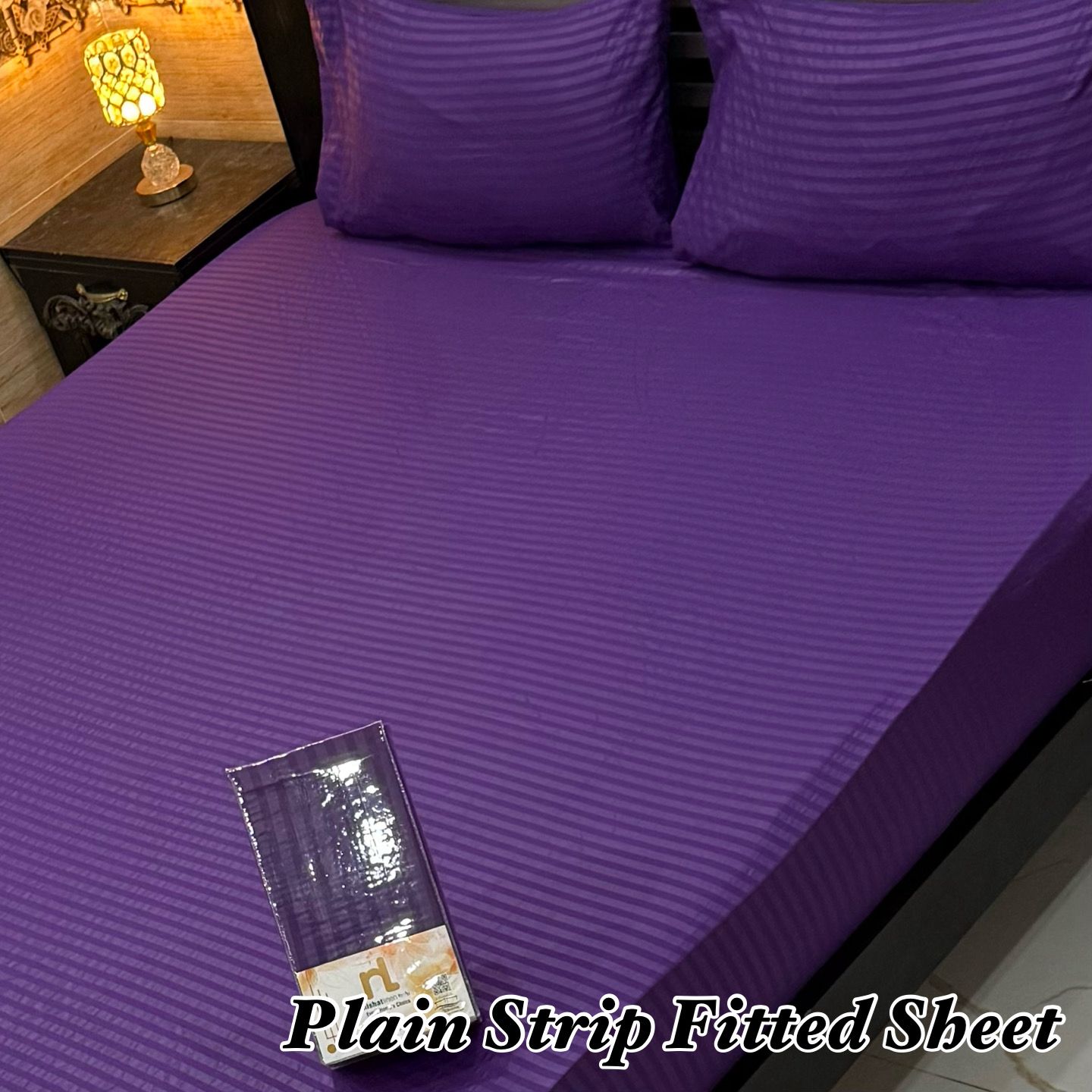 3Pc Micro Strip Fitted Bedsheet Set in purple with subtle striped texture, includes 1 fitted sheet and 2 pillow covers. Fits mattress sides up to 12 inches. Available in 8 colors.